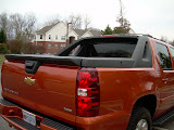 The rear passenger side of the Avalanche