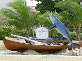 Guy Harvey boat exhibit outside of the Guy Harvey shop.