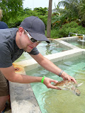 Did I mention we got to hold the baby turtles? Here's Chase.