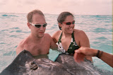 Chase and Katie holding a stingray.