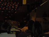 She's there somewhere.  (They liked to keep it darm in the church)