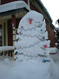 Snow Christmas tree with more snow!