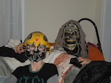 Chantel in Jay's transformer mask and Chase in his scary mask.