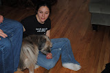 Katie coaxing Teddy out from hiding.