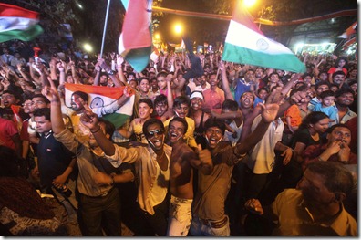 Indian cricket fans celebrate their team's World Cup win on the streets of Kolkata
