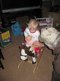 Baby Molly and Kate riding on their new horse!