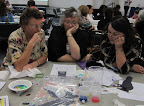 Teachers experience deep thinking at a conference session.