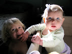 Yes, Lila is biting Simone's hand -- screaming ensues shortly after