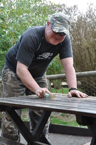 [Kris sanding down patio tables[14].jpg]