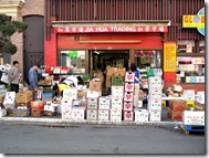 Trucks drop fresh vegetables and fruit right on the sidewalk
