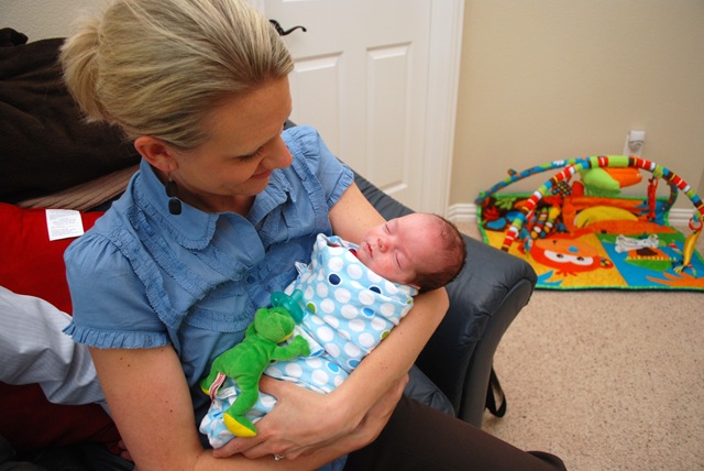 [Aunt Tara holding Landon for the first time[2].jpg]
