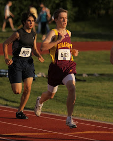 Scott Connolly sprinting towards the finish in the Men's Open 800m.