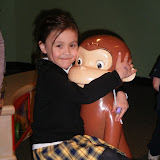 Hosannah hugging Curious George