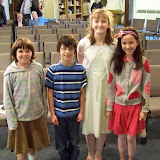 Left to Right: Sarah, Zach, Rebekka, and Joy posing for the camera before service begins