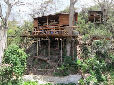 Multi shot panorama from on the suspension bridge which you can just make out on the far left of the pic. At the very bottom is the edge of the green tree frog habitat pond. Then you can see the hammocks and swings underneath the bar. To the top right is the owners & managers house, and then eagle eyed viewers may be able to spot the showers in the bushes to the right of the bar deck. IMG_2473-IMG_2494 (2).jpg