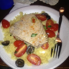 Pan-seared Tuna Steaks with tomato, basil and olive salad