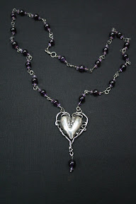 amethyst beads with silver heart and chain