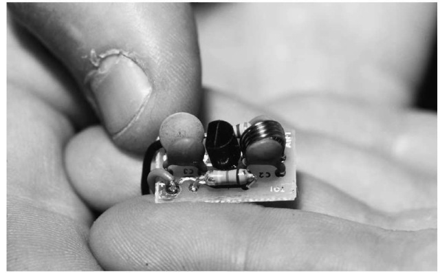 Tiny listening devices, like the one shown here, have a host of modern applications, from electronic eavesdropping to ultrasonic stereo systems.