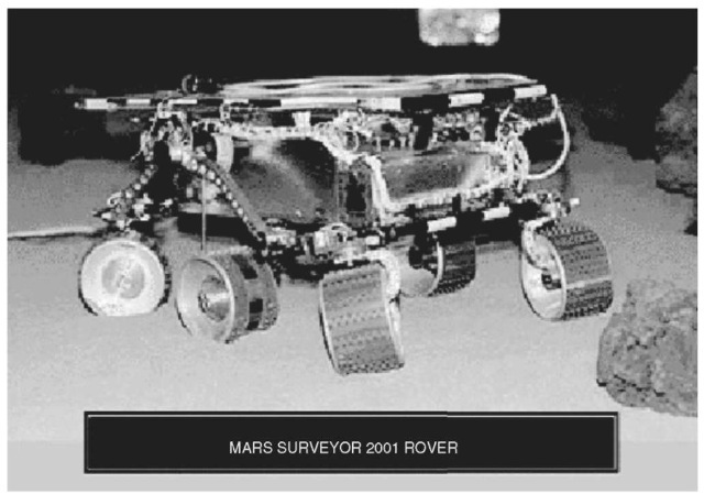 As part of the Mars exploration mission redesign, the plans for this rover have changed significantly. Current plans are to send the Marie Curie rover to Mars on a future lander. This rover is very similar to the Pathfinder Sojoumer Rover, and in fact is the same rover that was used within the Pathfinder "sandbox" test bed pictured above.  This figure is available in full color at http://www.mrw. interscience.wiley.com/esst.