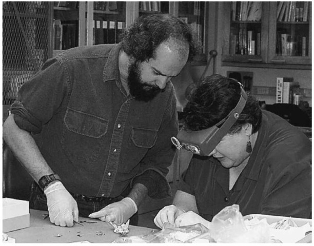  Dr Pepper Trail and Bonnie Yates examine osteological remains of endangered and protected birds recovered from a crime scene.