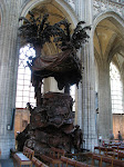 Baroque pulpit in St. Pieterskirk depicting St. Norbert