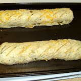 stretch and shape them into baguette style, or long loafs, cutting slits in it to let the steam out while cooking. Let rise/proof again. Half hour?  How does it look?