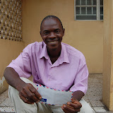  &ndash; Salu receiving $$$ gift in envelope for his family for Christmas. Salu is the father of Isha who died in 2006 after falling in a pot of boiling water. .......© 2007 NHA photos