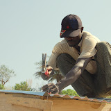  &ndash; Hammering down the zinc on the school....© 2008 NHA photos