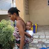  &ndash; Kadijah w/ Baby Laurence, affectionately know as ROO at St. Laurence House. (James Mansaray, photographer) 2007