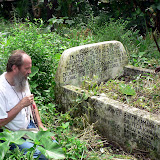  &ndash; Fr. Seraphim at mass gravesite (James Mansaray, photographer)