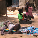  &ndash; Children in Freetown, playing and sleeping in dirt floor. May 2007 (James Mansaray, photographer)