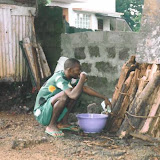  &ndash; Man brushing his teeth outside. 2002 (V. Hicks, photographer)