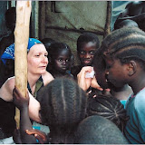  &ndash; Mama Vicki wiping noses in Displacement camps (James B. Mansaray, photographer)