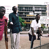  &ndash; Gentleman in the city center begging for assistance. They all suffered amputation during the civil war and are unable to provide for themselves. (V. Hicks, photographer, 2005)