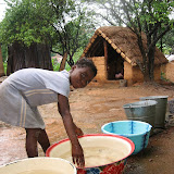  &ndash; Collecting water. © NHA, J Mansaray 2007