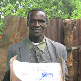 &ndash; Pa Foday with his supplies sent from Nazareth House, Louisville. © NHA, J Mansaray 2007