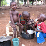  &ndash; Children scraping what is left a pot of rice. Freetown, Sierra Leone ©2007 NHA JMansaray photographer