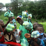  &ndash; Purchasing cucumbers from the children selling them on the roadside... © 2007NHA photographs/JBM