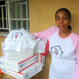 &ndash; Kadijah with shipments of toothpaste for distribution to those in need. ...© 2007NHA photographs/JBM
