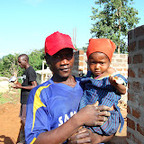  &ndash; Construction worker on the school project with his little girl -- Sept 2007.......© 2007 NHA photos