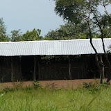  &ndash; Smiling Man's Village School. He says the children are unable to go because the fees are too high.......© 2007 NHA photos