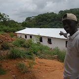  &ndash; May 2008. James pointing out the building's progress, Nazareth House Apostolate School in Kabala, Sierra Leone…. © 2008 NHA Media Photos