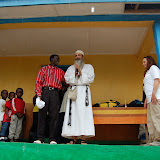  &ndash; Father Seraphim opens the uniform distribution process with prayer. ...© 2008 Nazareth House Media, JBM photographer