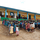  &ndash; Fr. Seraphim blesses the day, the students, the parents, the employees and the building..© 2008 September Nazareth House Apostolate Media, James B. Mansaray, photographer.
