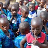  &ndash; Holy Water sprinkled on the children..© 2008 September Nazareth House Apostolate Media, James B. Mansaray, photographer.