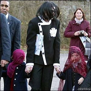 [mj with kids small[2].jpg]