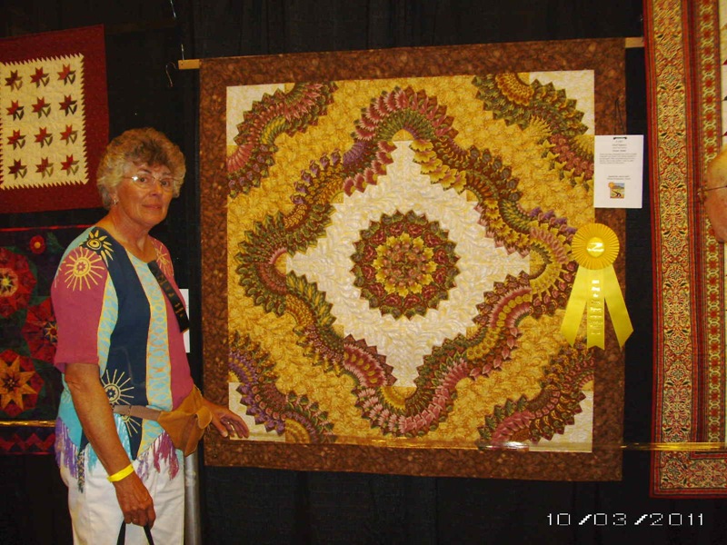 [Caryls quilt with ribbon[2].jpg]