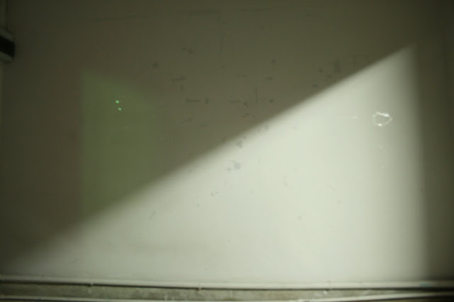 the wall after we cover the clues/dirts, taking foto without flash
