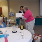 Alice Hix donates the family history to Cathy Reynolds, Archivist for the Wytheville Community College Library.