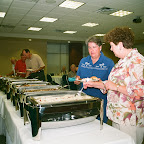 Sisters Cathy and Helen  discuss their the food.